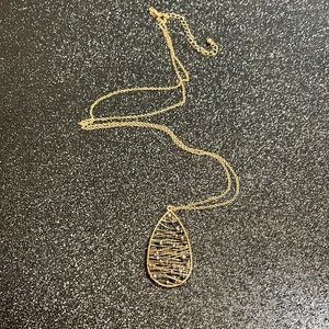 Long costume gold necklace w netted tear drop w charcoal stones